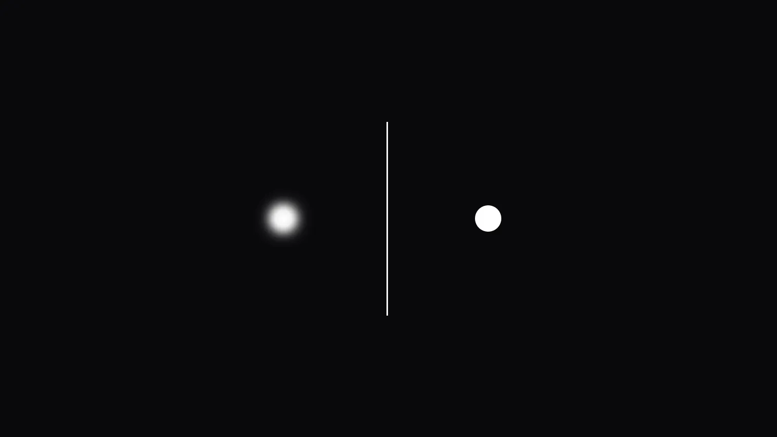 Two white circles on a black background, separated by a thin vertical white line: a diffuse, blurred glow on the left and a crisp, sharply defined disc on the right.
